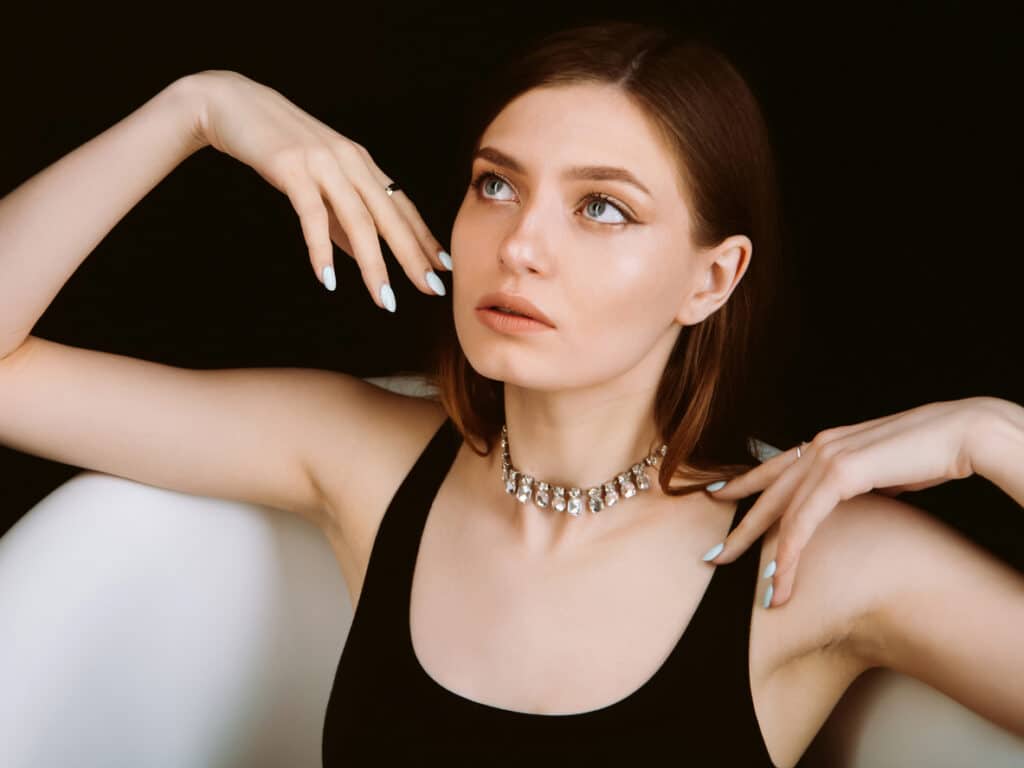 Woman receiving NeoGen Plasma skin treatment at Aesthetic Skin & Laser Center using nitrogen plasma energy to resurface, tighten, and rejuvenate the skin for improved tone, texture, and collagen stimulation.